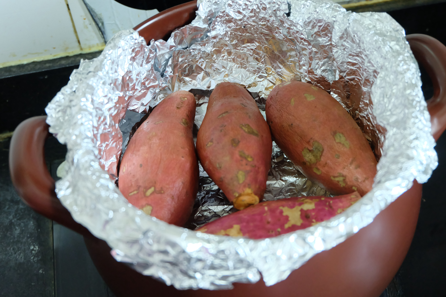 砂鍋版烤紅薯的做法 步骤8