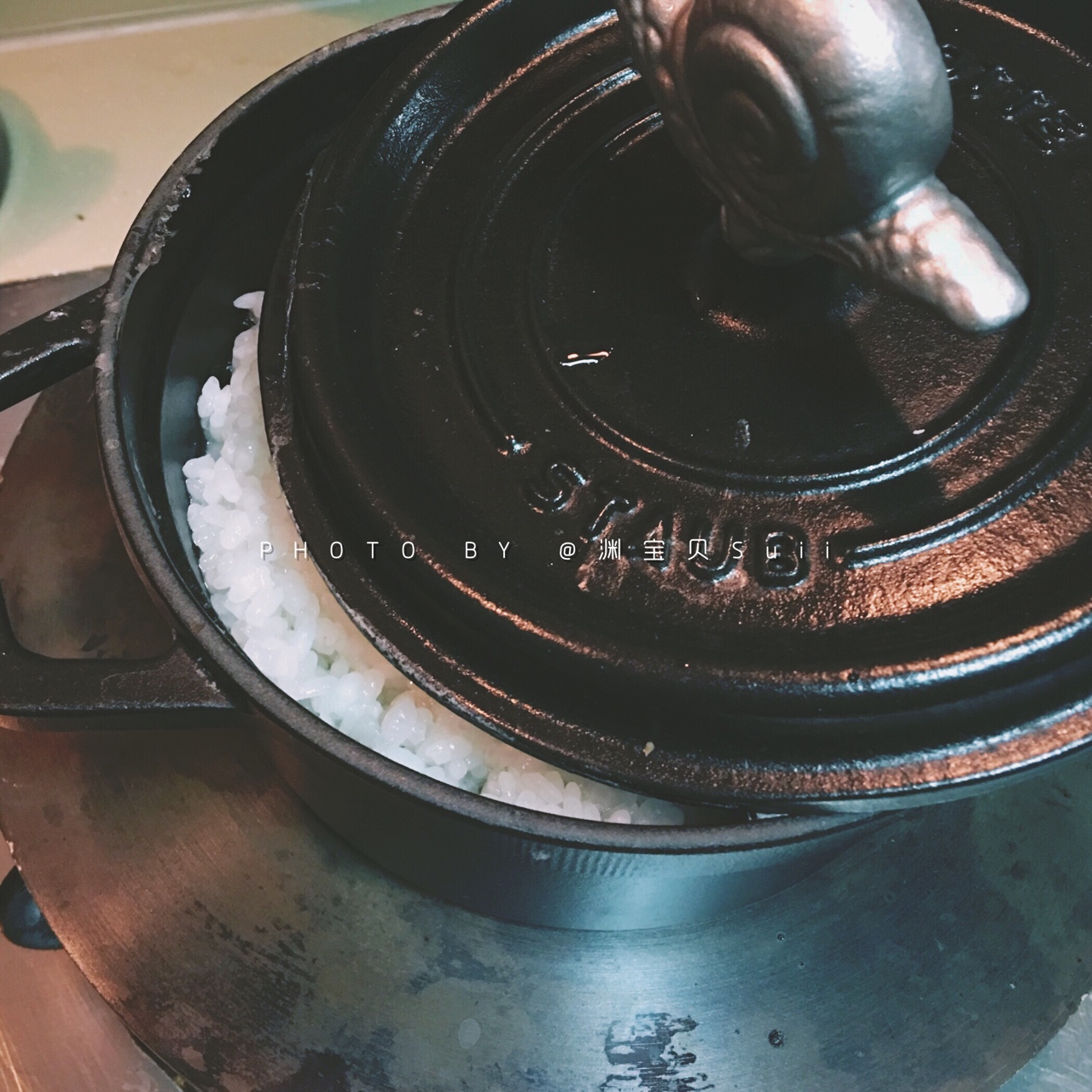 鑄鐵鍋煮飯（及關于沾底）的做法 步骤5