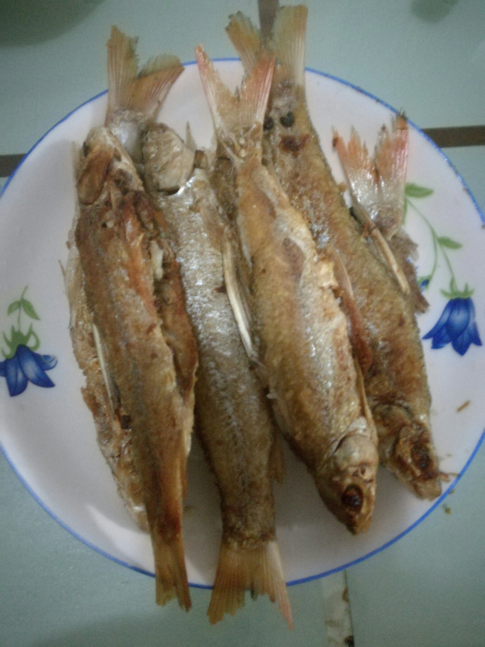 油煎腌制刁子魚的做法 步骤3
