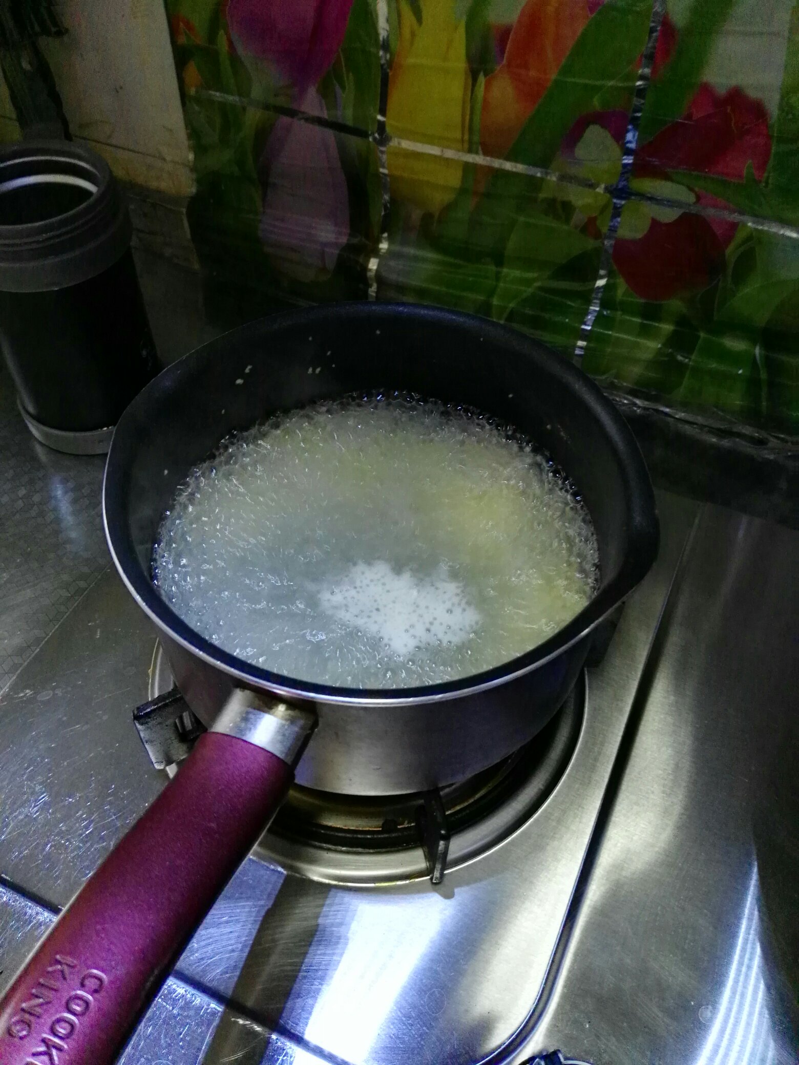 小米葡萄干粥的做法 步骤4