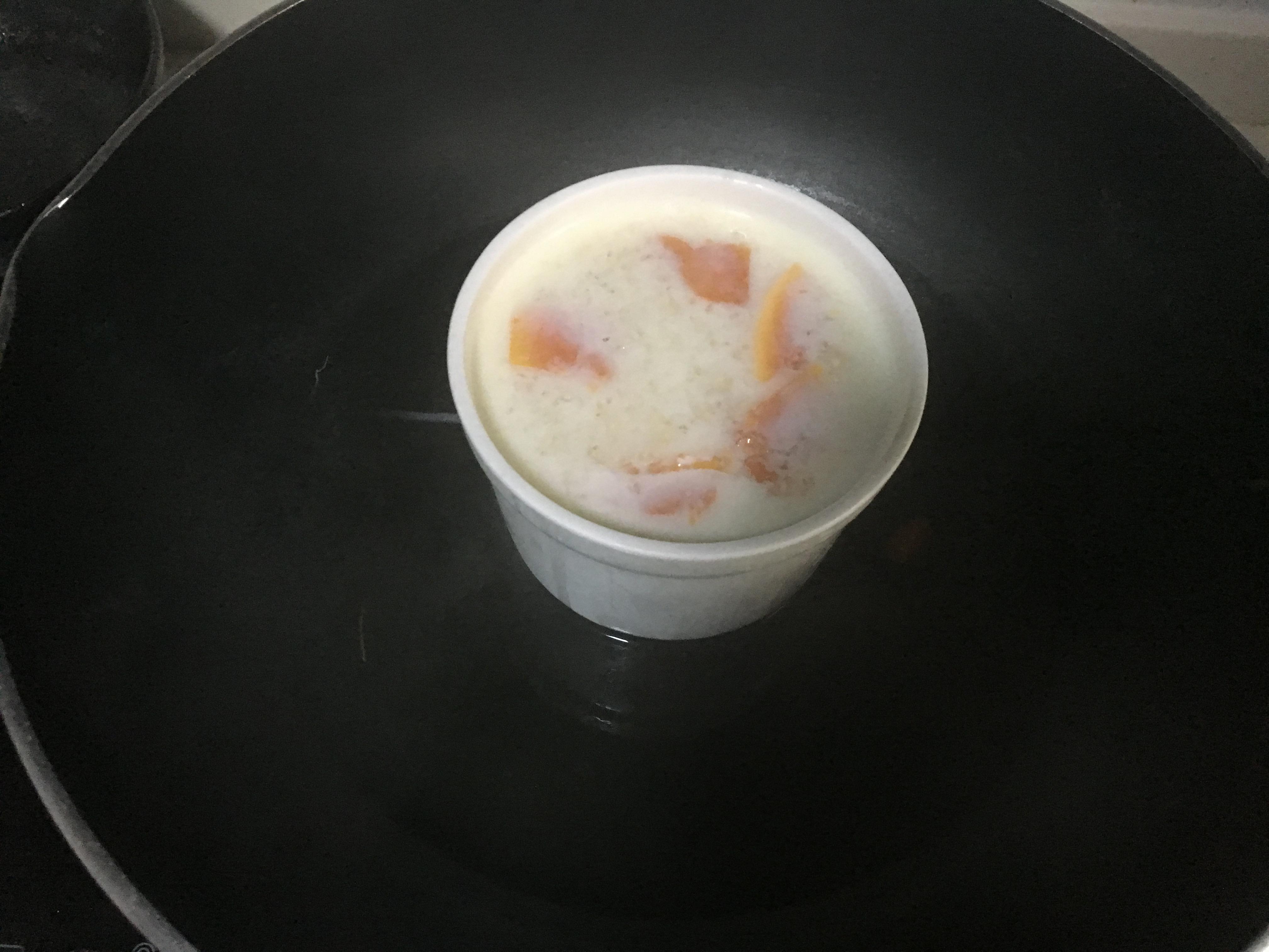 木瓜牛奶炖雪燕的做法 步骤4
