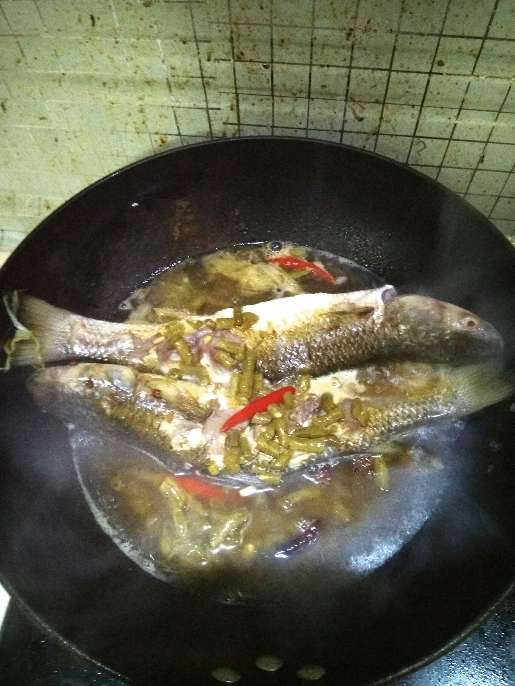 酸豆角炖海梭魚的做法 步骤6
