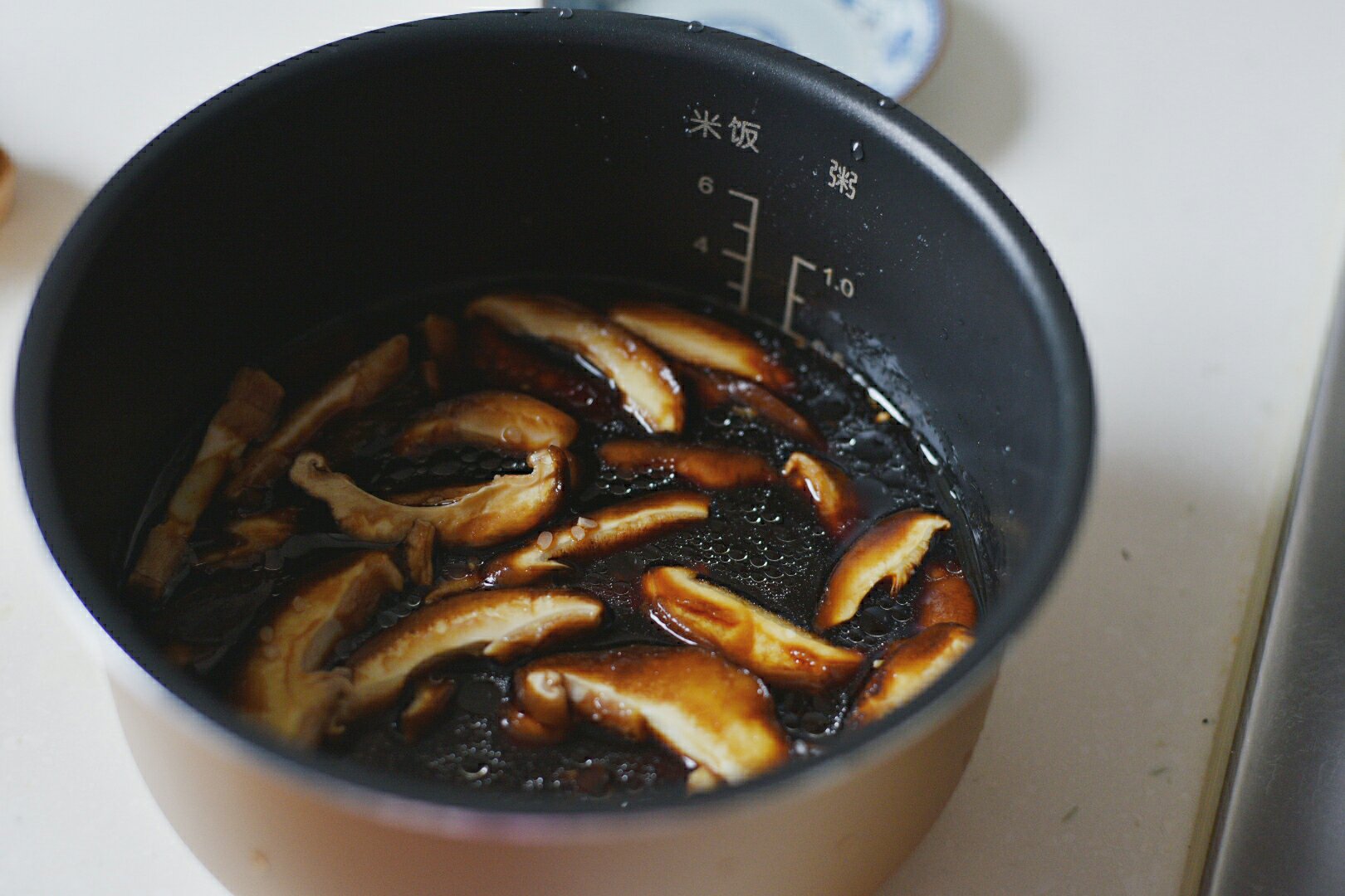 電飯煲香菇海鮮油飯的做法 步骤3