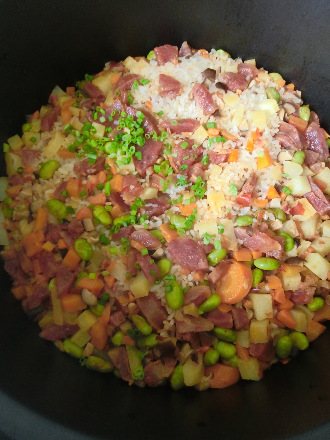 土豆臘腸燜飯的做法 步骤1