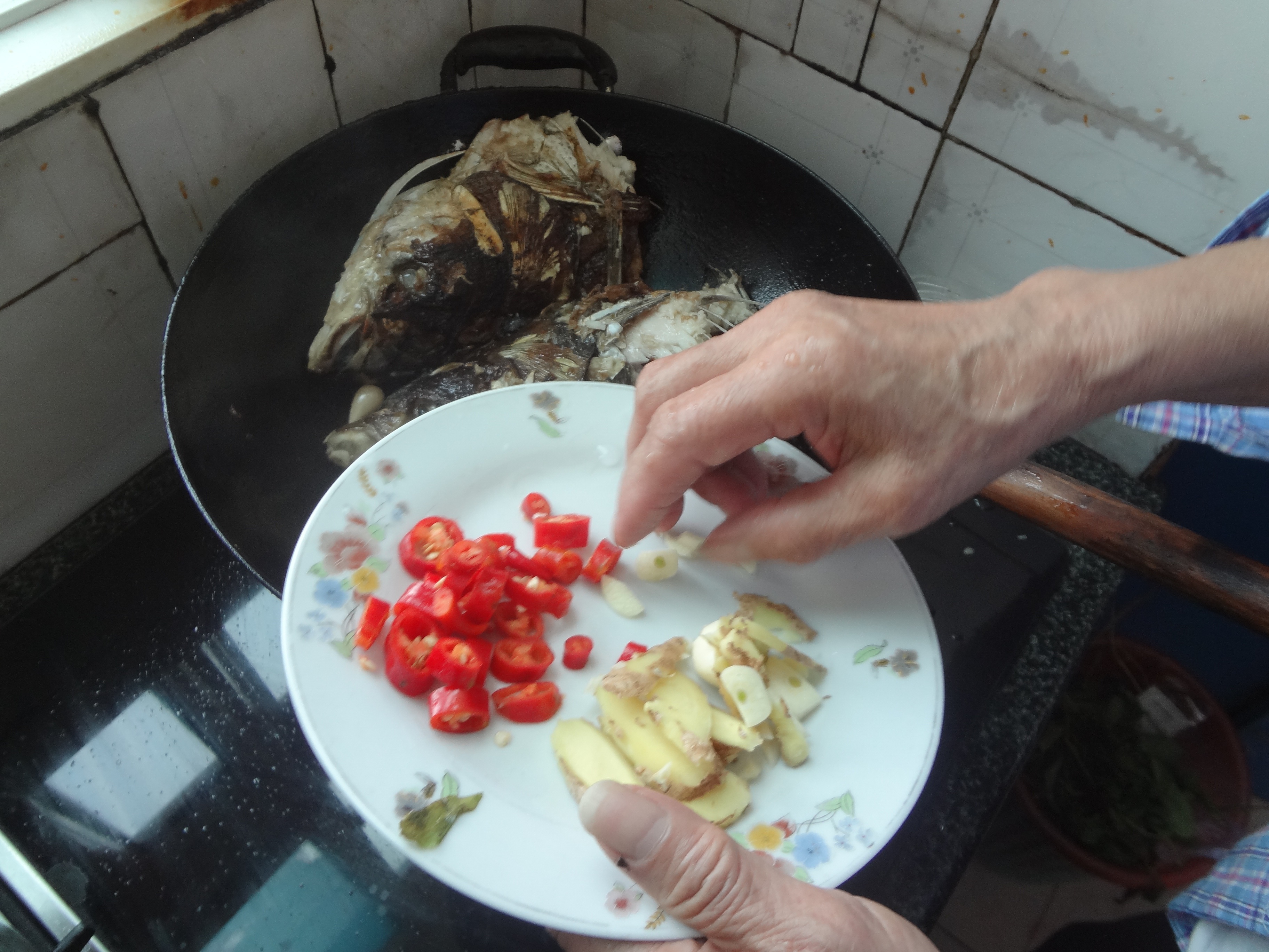 外婆私家水煮魚頭湯的做法 步骤9