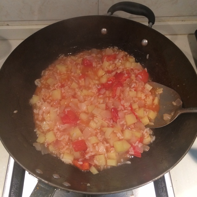 洋蔥土豆番茄燴飯的做法 步骤6