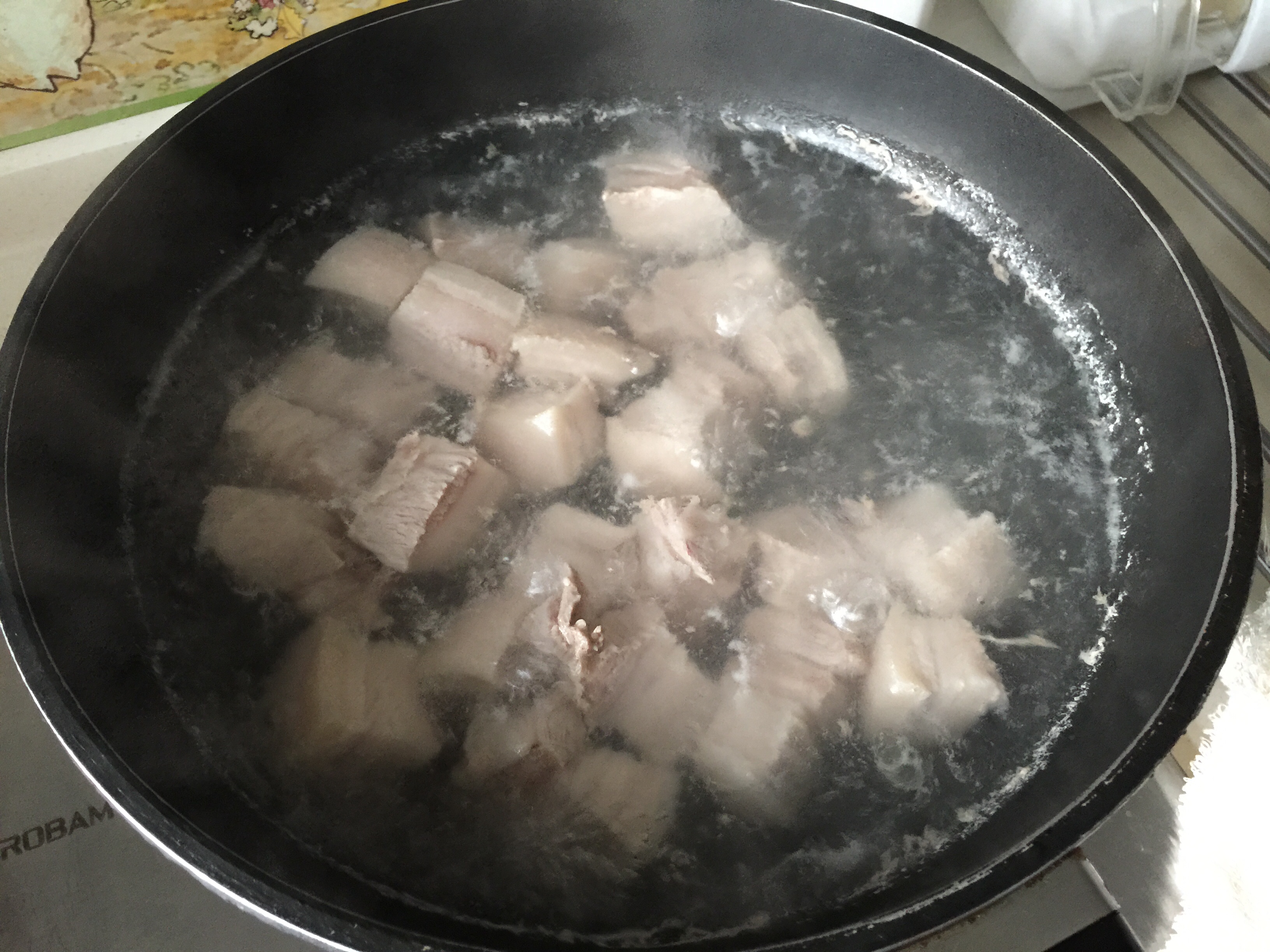 紅燒肉燜蒜薹的做法 步骤6