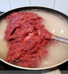 菠菜豬肝粥的做法 步骤6