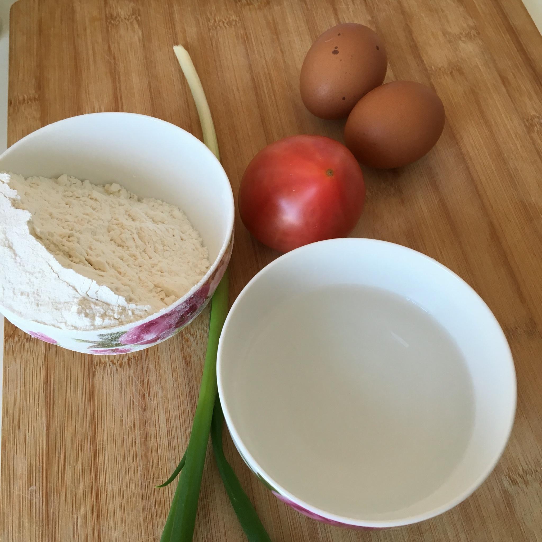 快手早餐---西紅柿雞蛋餅的做法 步骤1