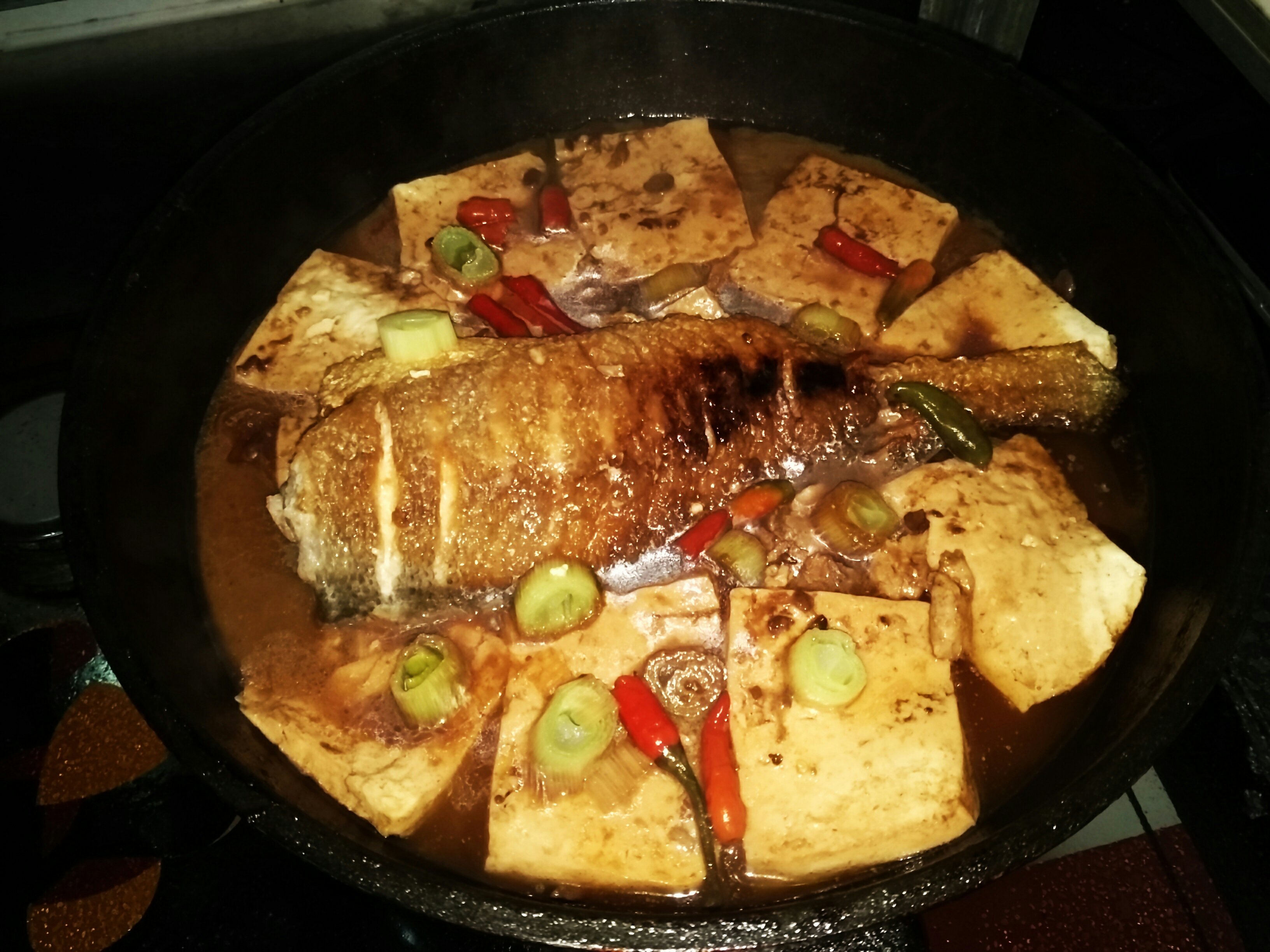 豆腐燜黃魚的做法 步骤7