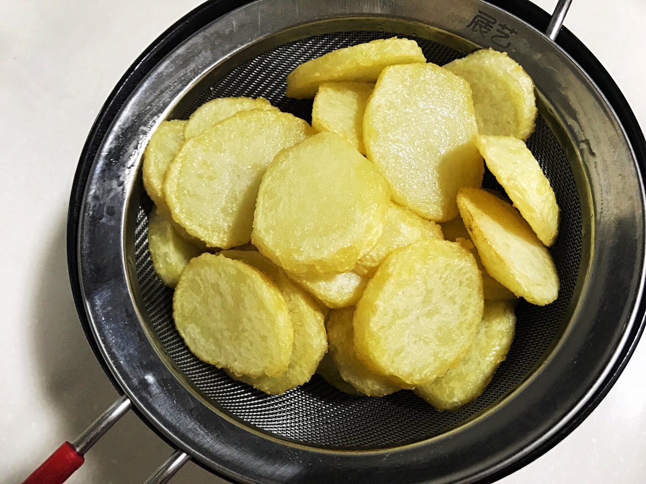 幹鍋土豆片的做法 步骤3
