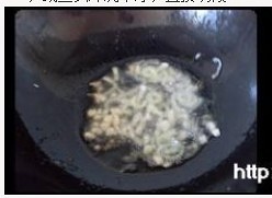 魷魚頭炒花菜的做法 步骤8